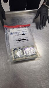 CBP seized currency in an evidence bag
